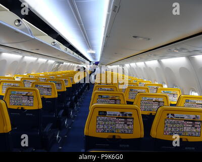 Empty Airplane cabin on a Ryanair flight, photograph showing all the plane seating with empty seats Stock Photo
