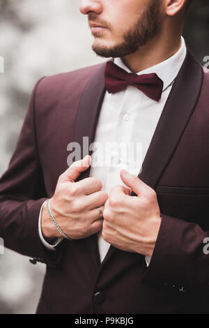 Groom wearing bow-tie close-up Stock Photo