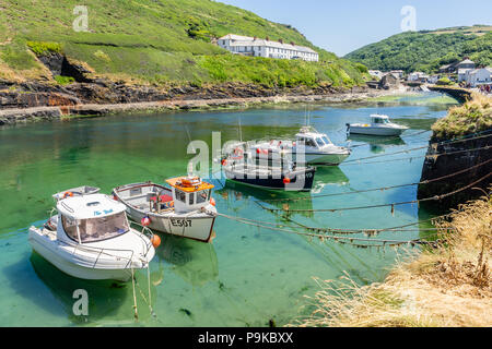 View of Boscastle with boats moored along the small harbour in summer 2018, Boscastle, North Cornwall, Cornwall, England, UK Stock Photo