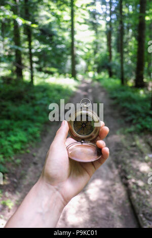 Man with compass in hand Stock Photo