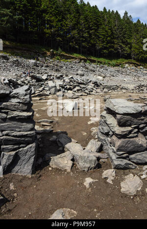 Haweswater, Cumbria UK. 19th July, 2018. An obvious doorway into an old property that was demolished to make way for the water that now fills the valley. Mardale Green was evacuated to make way for Haweswater Reservoir that was filled in the 1930's to aid drinking water to be pumped to Manchester over 80-miles away. Pic taken 19/07/2018. Credit: Stop Press Media/Alamy Live News Stock Photo