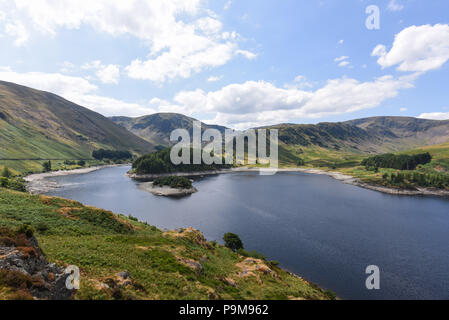 Haweswater, Cumbria UK. 19th July, 2018. The low water level of Haweswater Reservoir that was filled in the 1930's to aid drinking water to be pumped to Manchester over 80-miles away. Pic taken 19/07/2018. Credit: Sam Holiday/Alamy Live News Stock Photo