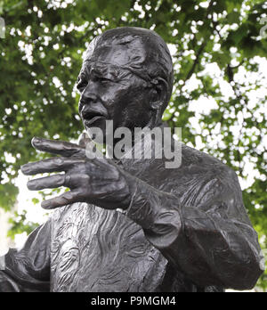 The statue of Nelson Mandela in Parliament Square, London, is a bronze sculpture of former President of South Africa and anti-apartheid activist Nelso Stock Photo