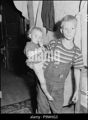 A miner's children. Kentucky Straight Creek Coal Company, Belva Mine, abandoned after explosion (in) Dec. 1945, Four... - Stock Photo