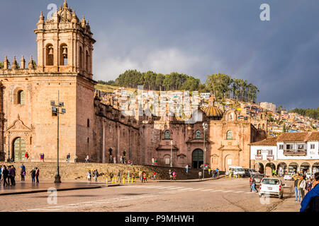 Cusco Cathedral side view and hillside homes in Plaza de Armas, Cusco, Cuzco, Peru, South America. Stock Photo
