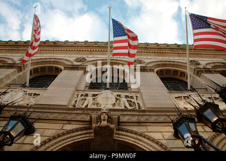 American flags on the facade of Boston Public Library Stock Photo