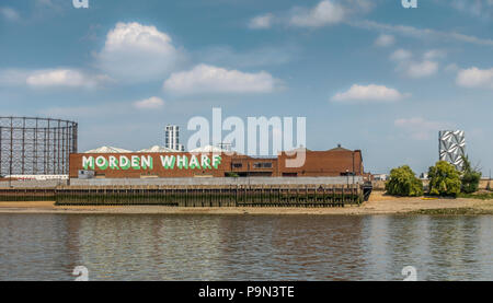 Morden Wharf, a former sweeteners refinery on Greenwich Peninsula, now a major regeneration site. The Optic Cloak sculpture. Gasometer, Stock Photo