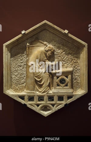 Allegory of architecture depicted in the hexagonal relief by Italian Renaissance sculptor Andrea Pisano and assistants (1348-1450) from the Giotto's Campanile (Campanile di Giotto), now on display in the Museo dell'Opera del Duomo (Museum of the Works of the Florence Cathedral) in Florence, Tuscany, Italy. Stock Photo