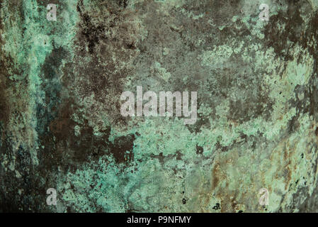 Soft focus looking, colourful copper metal sheet showing natures corrosion,background,overlay or texture. Stock Photo