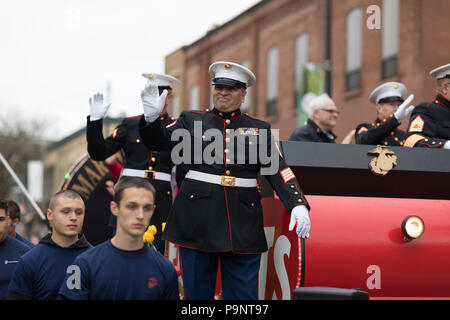 Holland, Michigan, USA - May 12, 2018 US Marines on a float wave at the spectators at the Muziek Parade, during the Tulip Time Festival Stock Photo