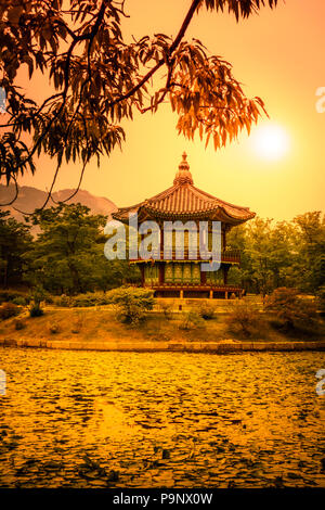 Seoul, Korea - May 11, 2017:  The Pavilion of Far-Reaching Fragrance is a small pagoda on an artificial island in Gyeongbokgung Palace. Stock Photo
