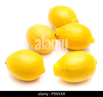 Composition of five whole yellow lemons isolated on white background Stock Photo