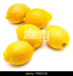 Composition of five whole yellow lemons isolated on white background Stock Photo