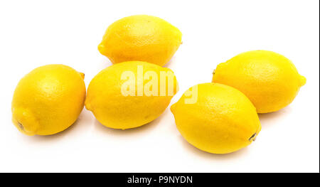 Composition of five whole yellow lemons isolated on white background Stock Photo