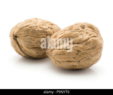 Two unshelled walnuts isolated on white background Stock Photo