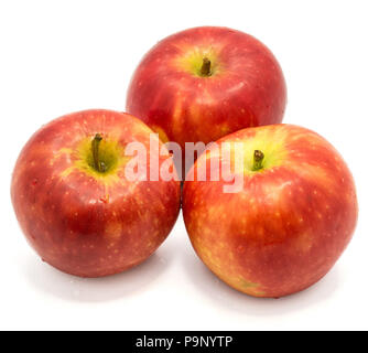 Three whole red Kanzi apples isolated on white background Stock Photo
