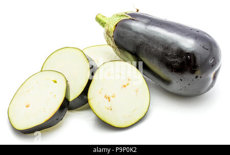 One whole and sliced eggplant (aubergine), cut in round circles, isolated on white background Stock Photo