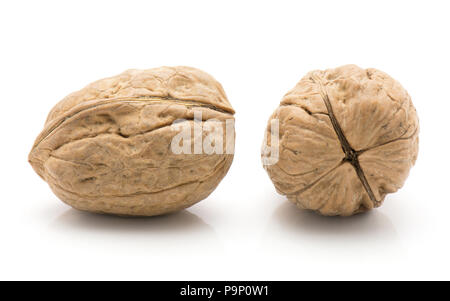 Unshelled walnuts isolated on white background two whole Stock Photo