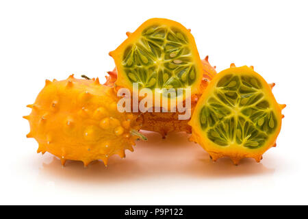 Kiwano isolated on white background two whole two halves Stock Photo