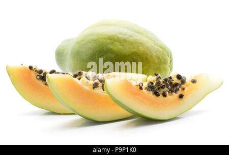 Green papaya (pawpaw, papaw) one whole three slices with seeds isolated on white background Stock Photo