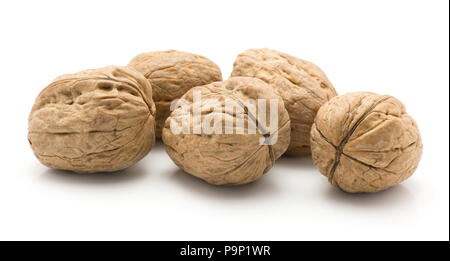 Unshelled walnuts isolated on white background five whole Stock Photo