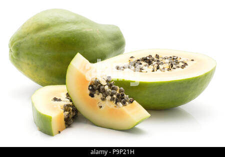 Sliced green papaya (pawpaw, papaw) isolated on white background one whole one half and two slices orange flesh with seeds Stock Photo