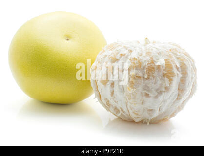 One peel pamelo comparing with unpeeled one isolated on white background Stock Photo