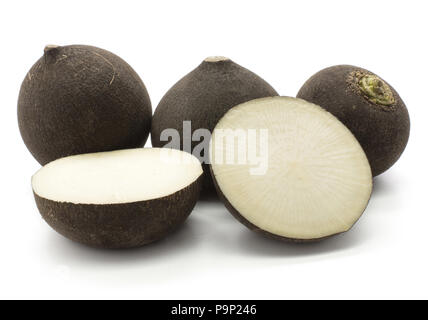 Sliced black radish and three bulbs isolated on white background Stock Photo