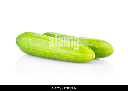 Pair of fresh green mini cucumbers isolated on white background Stock Photo