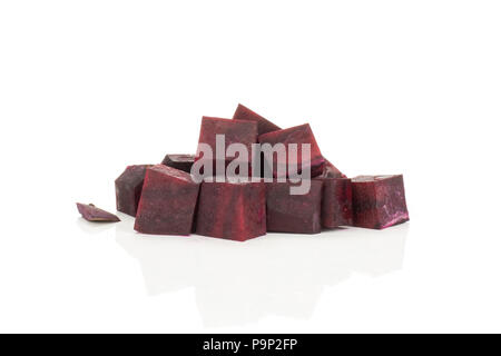 Red beet slices cut squared pieces isolated on white background Stock Photo
