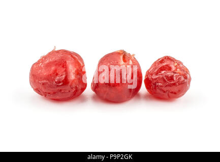 Three red dry cherries isolated on white background in row Stock Photo