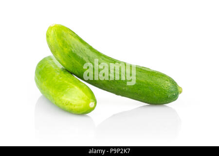 Two fresh green mini cucumbers isolated on white background Stock Photo