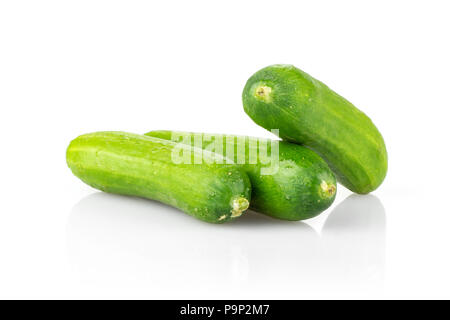 Three mini cucumbers isolated on white background Stock Photo