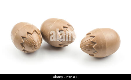 Three chocolate eggs isolated on white background Stock Photo
