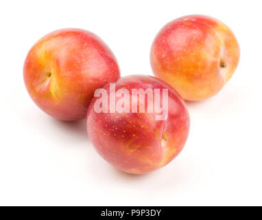Plums red orange three ripe isolated on white background Stock Photo