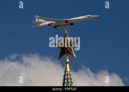 The Tupolev Tu-160 strategic bomber of the Russian Air Force flies over the Kremlin during a rehearsal for the Victory Day military parade to celebrat Stock Photo