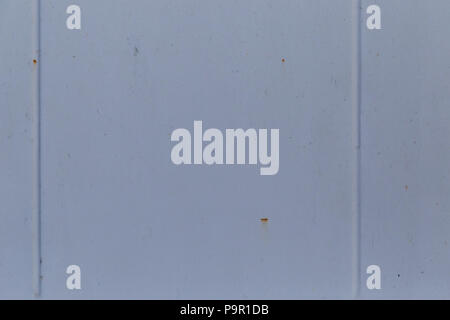 Light blue metal car paint surface. Metal matte blue wallpaper background. Stock Photo