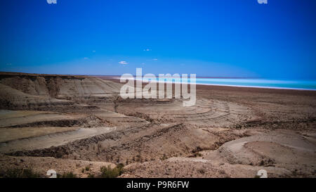 Panorama view to saline Barsa Kelmes lake and Ustyurt plateau at Karakalpakstan, Uzbekistan Stock Photo