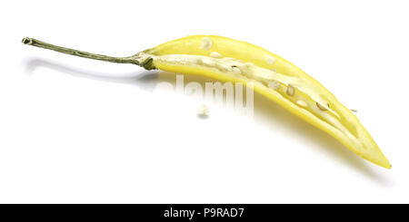Yellow Chili pepper, one half, isolated on white background Stock Photo