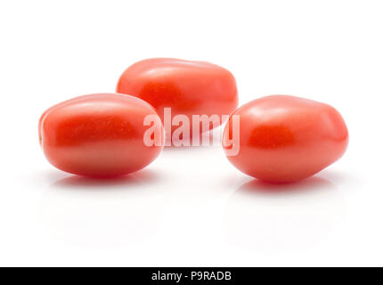 Three cherry tomatoes isolated on white background Stock Photo