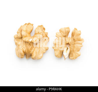 Two shelled walnuts top view isolated on white background Stock Photo