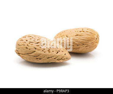 Two unshelled almonds isolated on white background Stock Photo