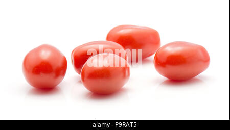 Five cherry tomatoes isolated on white background Stock Photo