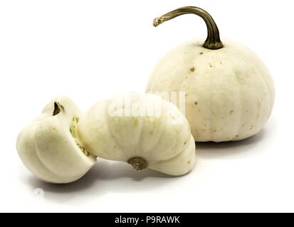 One whole white pumpkin, two white halves isolated on white background Stock Photo