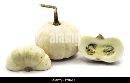 One whole white pumpkin, two white halves isolated on white background Stock Photo