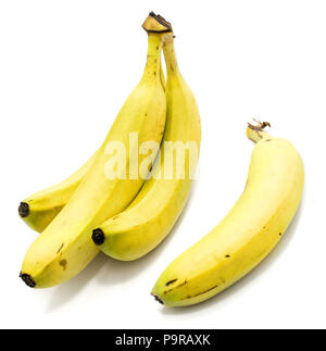 Group of yellow whole bananas isolated on white background Stock Photo