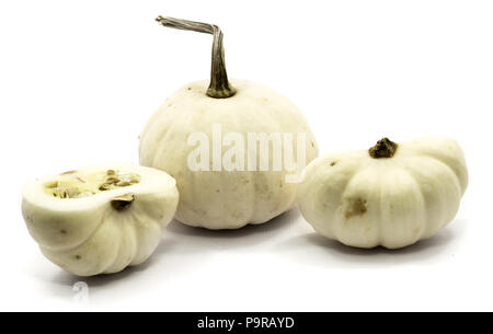 One whole white pumpkin, two white halves isolated on white background Stock Photo