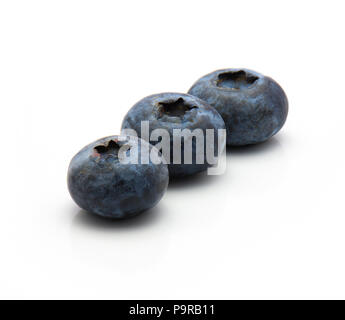Three bog blueberries in row isolated on white background Stock Photo