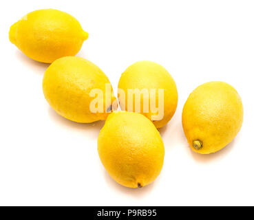 Composition of five whole yellow lemons isolated on white background Stock Photo