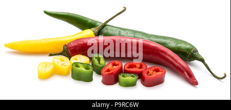 Whole Chilli peppers and slices isolated on white background three colors composition (red, yellow, green) Stock Photo